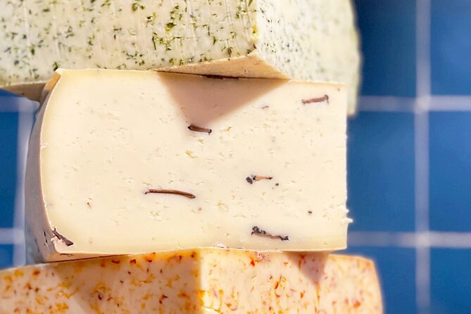 10+ tastings Gourmet Food & Wine Tour in the Heart of Paris - La Fromagerie du Louvre: Cheese Tasting in a City of 246 Varieties