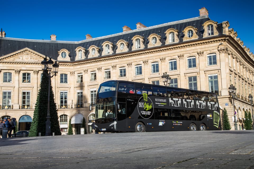 Bus Toqué Champs Elysées Tour w/ 3-Course Dinner & Champagne - Your table setup: tablets, Wi‑Fi, and a guide that doesn’t boss you around