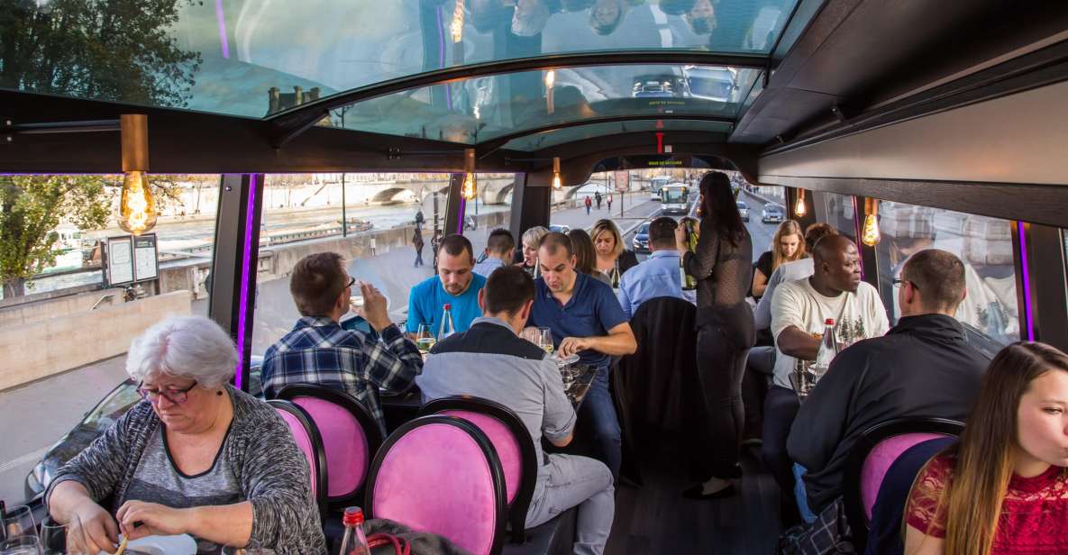 Bus Toqué Champs Elysées Tour w/ 3-Course Dinner & Champagne - Night views on the Champs-Élysées route: seeing Paris without standing in line