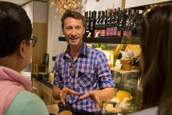 Cheese and Wine Tasting in the Latin Quarter with Chef Alex - Catherine’s market introduction: producers, festive energy, and smart shopping instincts