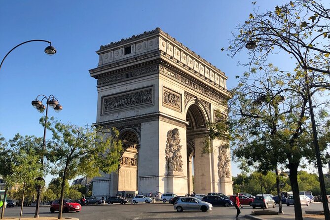 City Walking Tour: See the Top 5 Paris Highlights in a Day - Arc de Triomphe and the Champs-Élysées crossover moment