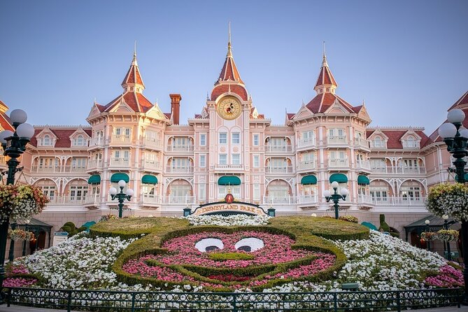 Disney Land Paris 1 Day Tour with Private Transportation Included - Entering Disneyland Paris through the main gate with tickets in hand