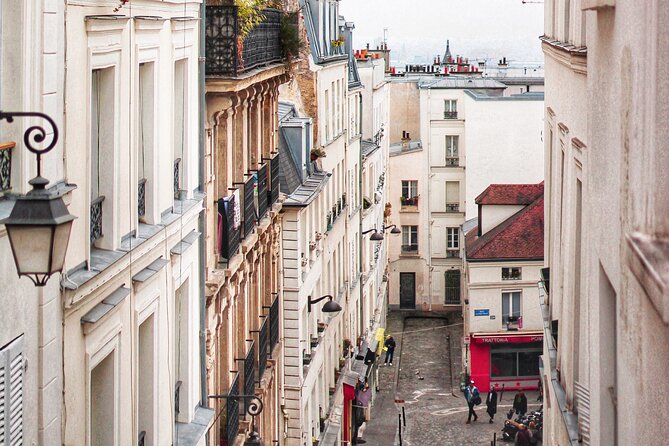 Exclusive Walking Tour In Montmartre With Local Guide - Ezrah’s way: history with street-level personality