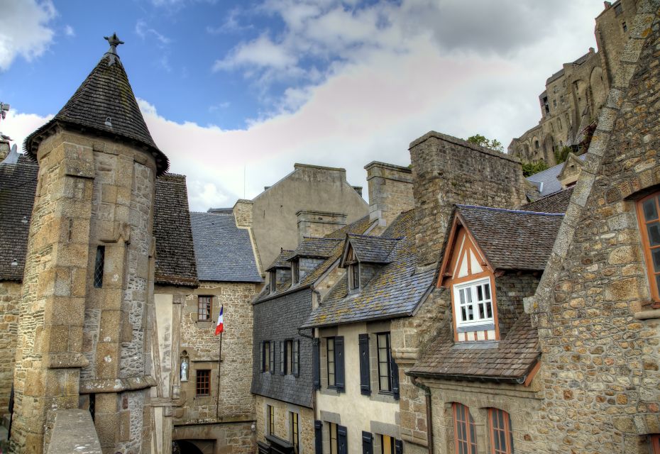 From Paris: 2-Day Normandy & Brittany Tour - Mont Saint-Michel: abbey visit, lots of steps, and smart free time