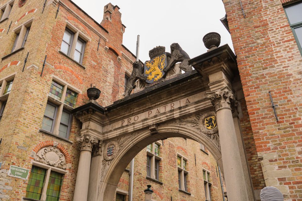 From Paris: Bruges Guided Tour with Hotel Pickup - The Guided Walking Tour: Town Hall, Place du Boulevard, and Fast Orientation