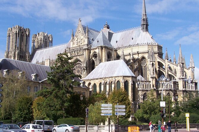 Full Day All-inclusive Tour in Champagne from Paris in a Minivan - Notre-Dame de Reims: cathedral time that feels meaningful