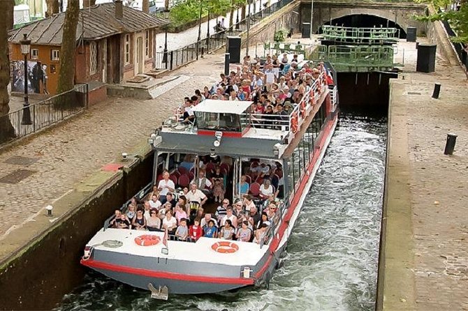Guided Cruise The Old Paris on Canal Saint Martin - Canal Saint-Martin’s tree-lined banks and iron footbridges