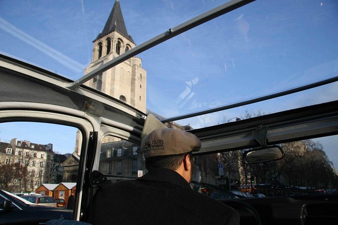 Half day trip in Paris in a vintage and convertible car with a Parisian - Louvre and Eiffel Tower views from the street, not the crowds