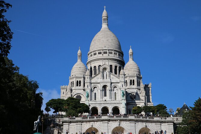 Half-day Walking tour with Fun Guide & Arc du Triomphe Tickets - Notre-Dame area, Île de la Cité, and Pompidou/Marais energy