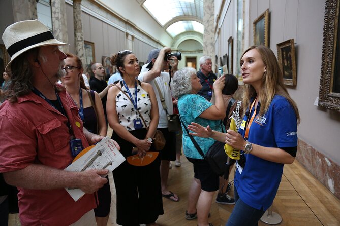 Louvre Masterpieces Express Guided Tour & French Wine Tasting - How the guide pacing can feel: fast is the point, but it can sting