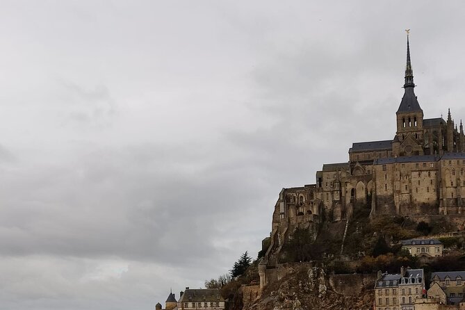 Mont Saint Michel Private VIP Tour with Champagne from Paris - Stop 2: Omaha Beach, German bunkers, and the Les Braves memorial