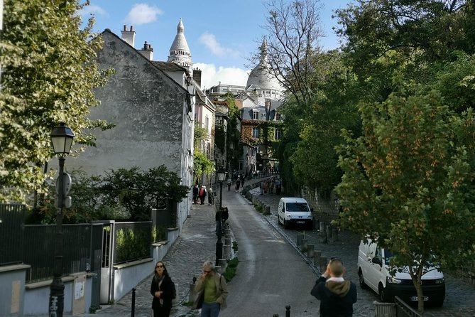 Montmartre and Sacre Coeur Private Guided Tour in Paris - The Picture-Postcard Street Walk: Following Artists Through Montmartre