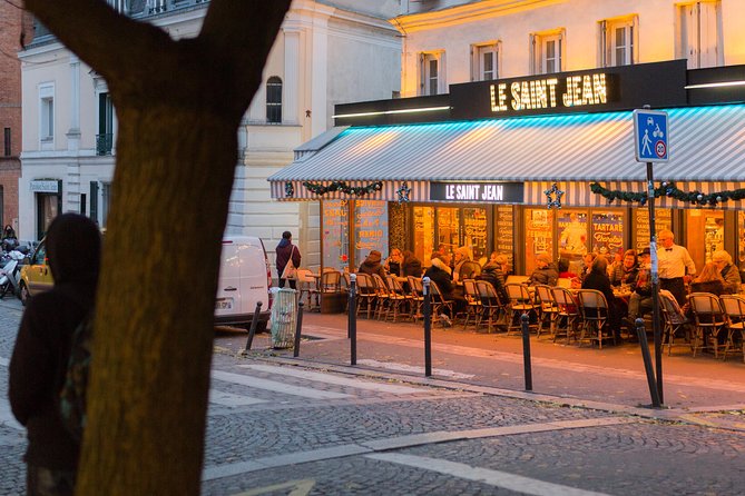 Montmartre French Bistrot Style Food & Wine Tasting Tour - Place du Tertre: cobblestones, art streets, and wine stories