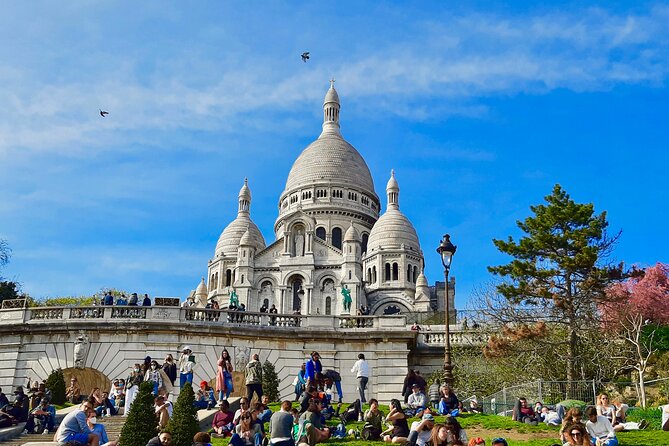 Montmartre Guided Walking Tour: Famous Artists and Cabarets - Le Moulin de la Galette: windmills that inspired art