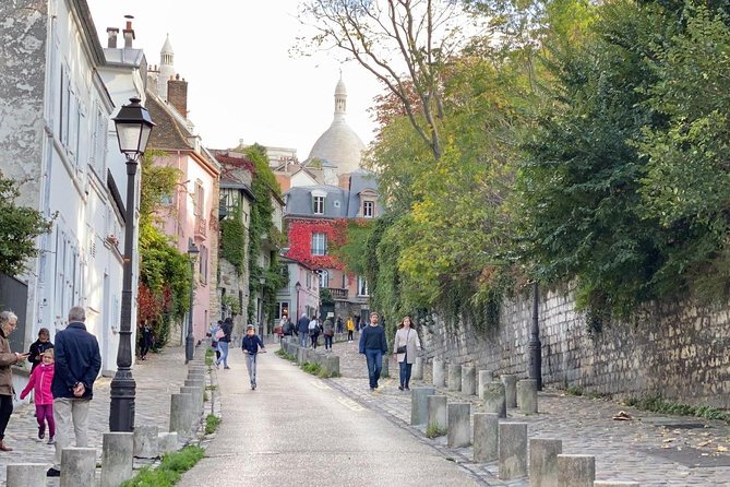 Montmartre Semi Private Tour: from Moulin Rouge, to Sacré-Cœur - Reaching Sacré-Cœur: views, white stone, and outside-first timing