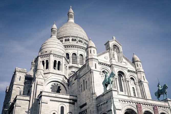 Montmartre Walking Tour Cultural Charm and Tasty Treats - Moulin Rouge: can-can roots and bohemian nightlife context
