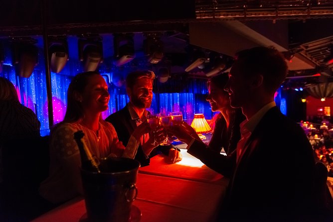 Moulin Rouge Dinner Show with Champagne and Drop Off - Dress code: look sharp, avoid awkward admissions