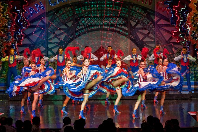 Moulin Rouge Dinner Show with Champagne and Drop Off - Inside the show: Doriss Girls, moving stairs, and the giant aquarium