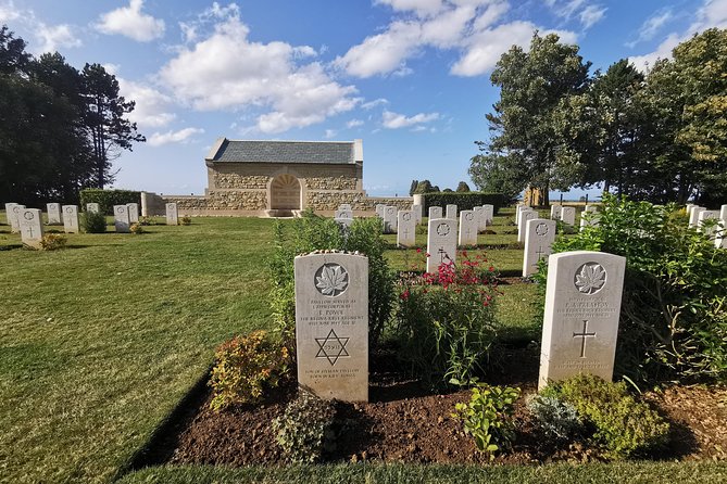 Normandy Landing Beaches Private Day Tour from Paris - Arromanches-les-Bains: WWII Harbor Ruins and the View