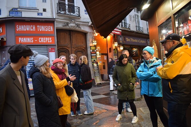 Notre-Dame Cathedral Exterior & Latin Quarter Guided Tour - Fontaine Saint-Michel and the Latin Quarter streets: where stories start before you reach the big sites
