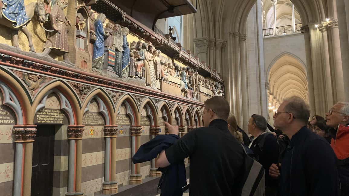 Notre-Dame Cathedral Exterior & Latin Quarter Guided Tour - Notre-Dame Cathedral exterior: sculptures, gargoyles, and the 2019 fire story