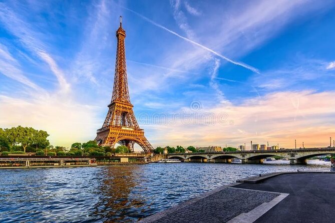 Paris 10-Hour Guided Louvre, Eiffel Tower & Seine River Cruise - Le Marais: cobblestones, boutiques, and an old-city feeling