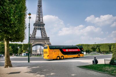 Paris: Audio-Guided Bus Tour & Seine River Cruise - Riding the Luxury Coach: How the Audio + Host Works