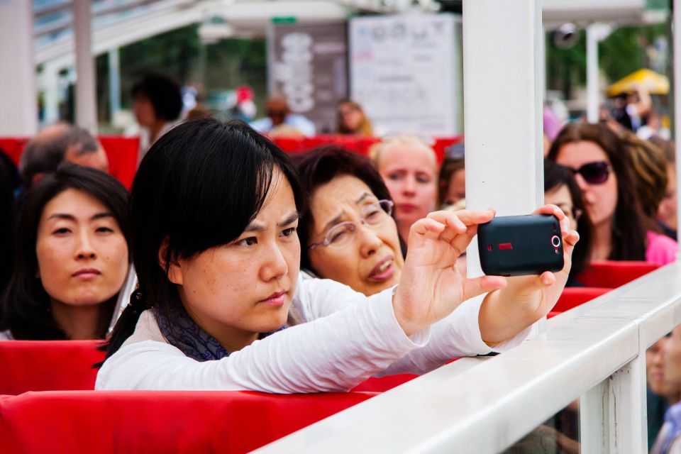 Paris: Audio-Guided Bus Tour & Seine River Cruise - Music, Lyrics, and Storytelling on Headsets
