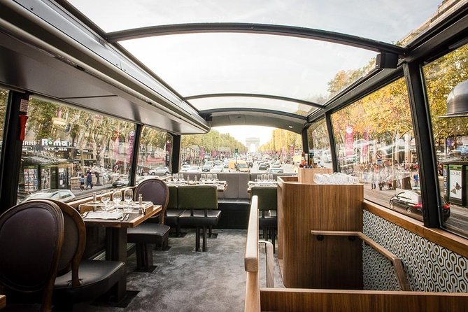 Paris Bustronome Gourmet Sightseeing Lunch on a Panoramic Bus - How much is really explained: audio guide, QR codes, and French music