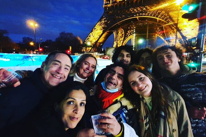 Paris by night in a Private Tuktuk Tour - Arc de Triomphe and the Champs-Elysées pop at night