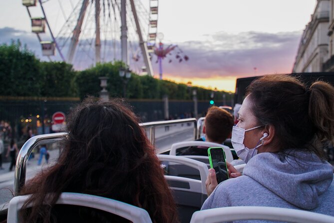 Paris by Night Tootbus Tour - Louvre and Place Vendôme: classic Paris in quick succession