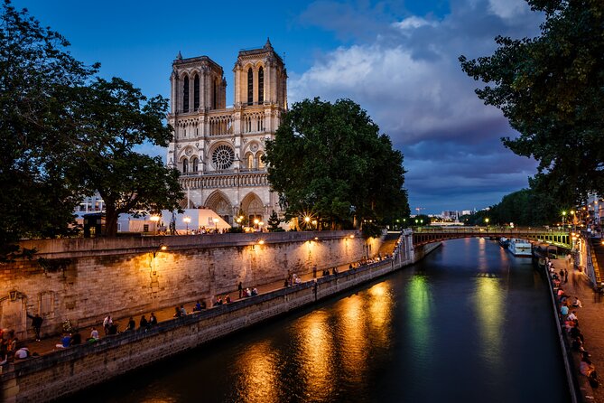 Paris by Night Tootbus Tour - Moulin Rouge mention: cabaret culture as part of the night mood