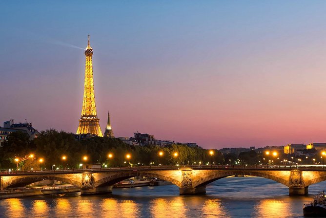 Paris By Night with Seine River Cruise and Roundtrip Luxury Transportation - Eiffel Tower to the major icons: the illuminated drive that makes sense