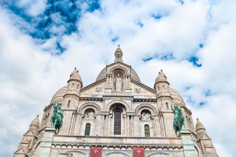 Paris: Charms of Montmartre Guided Walking Tour - The last vineyard in Paris and a cabaret that sparks trouble