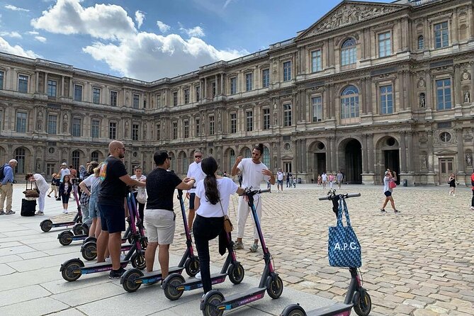 Paris City Tour by E-Scooter with Fun Guide (Small groups) - Champs-Élysées sweep and Arc de Triomphe: the city’s grand axis