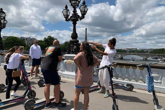 Paris City Tour by E-Scooter with Fun Guide (Small groups) - Eiffel Tower from a secret viewpoint: why that 15 minutes is the point