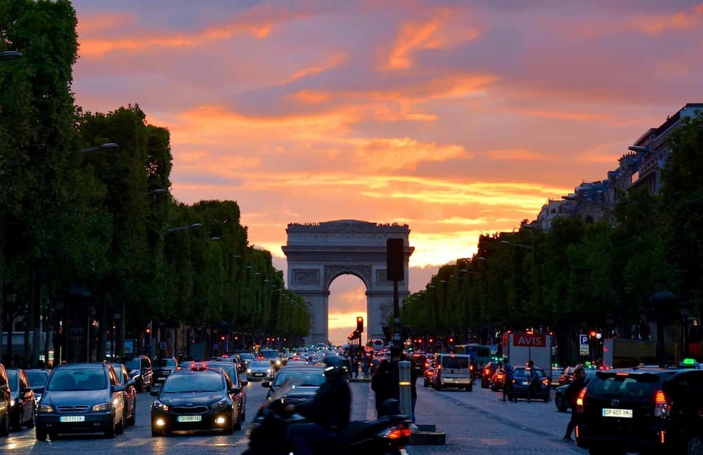 Paris: City Walking Tour and Seine River Cruise - Place Vendôme meeting point and how the pace will feel