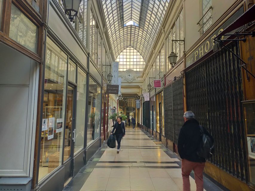 Paris: Covered Passages Walking Tour - Passage Jouffroy: glass-and-iron photo lines and the wax museum