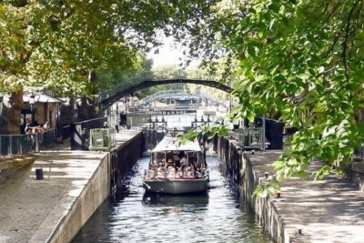 Paris: Cruise on The Canal Saint Martin and The Seine River - Canal Saint-Martin: trees, iron bridges, and cafés with a purpose