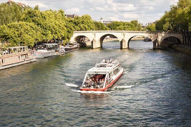 Paris: Cruise on The Canal Saint Martin and The Seine River - Notre-Dame, the Louvre, Tuileries, Orsay, and the bridge lineup