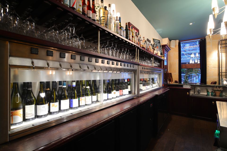 Paris: Dinner with Customized Wine Selection - The wine bar atmosphere: 40+ wines by the glass