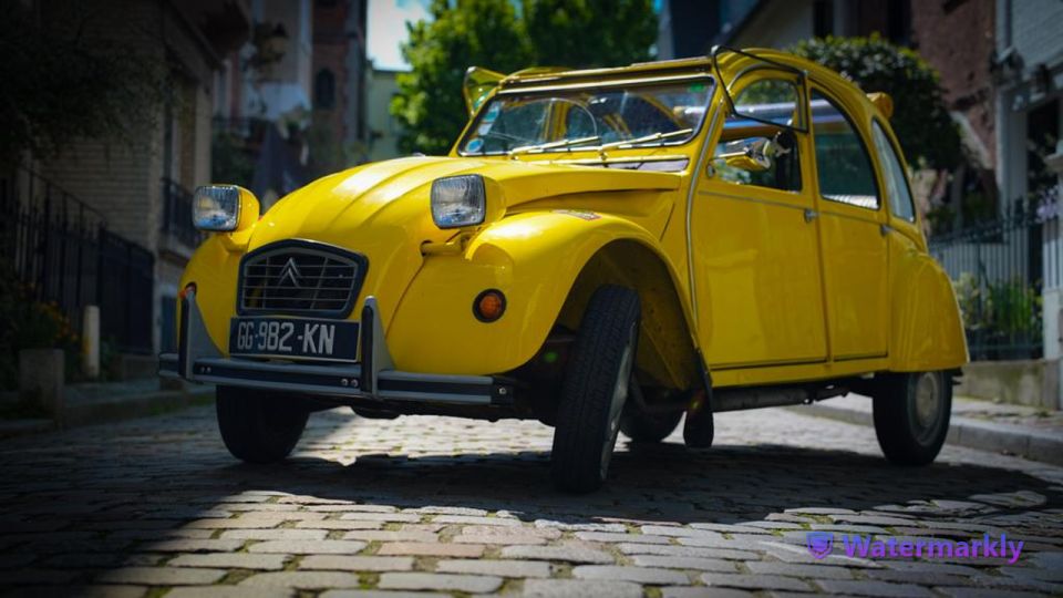 Paris: Discover Paris 2CV - Eiffel Tower, Arc de Triomphe, and École Militaire Without the Long Detour