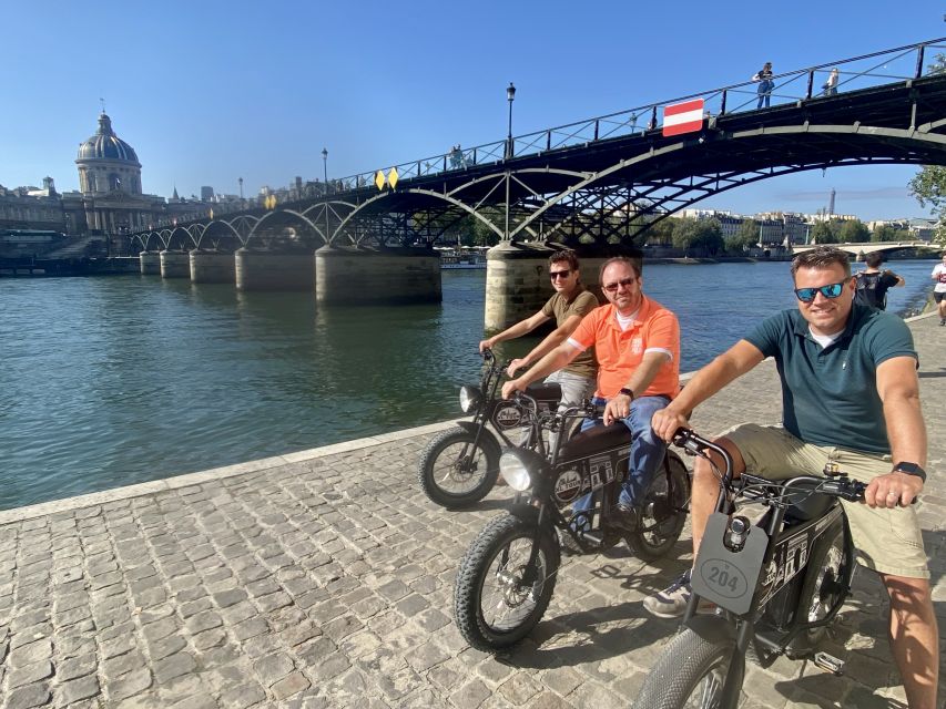 Paris: Eiffel Tower and Notre Dame Night Tour by E-Bike - Louvre and Tuileries: starting with Paris’s postcard spine