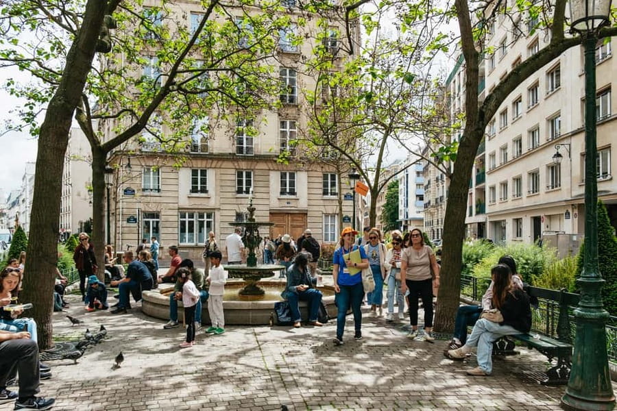 Paris: Emily TV Show Locations Guided Walking Tour - Musée de la Monnaie: fashion, auctions, and 300,000 treasures