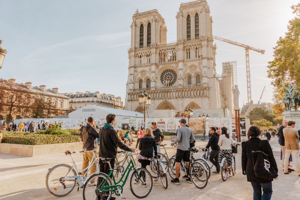 Paris: Famous Monuments Cycling Tour - Louvre courtyards and the pyramid view: classic angles, manageable stress