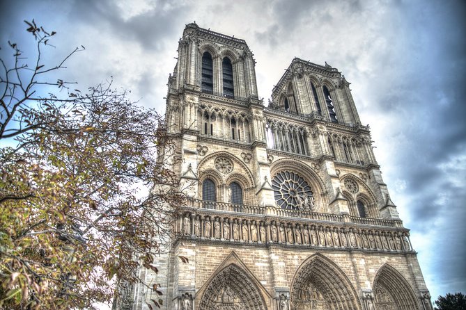 Paris First Time Private Tour with Notre Dame, Montmartre & Arc de Triomphe - Notre-Dame de Paris: getting close after the 2019 fire
