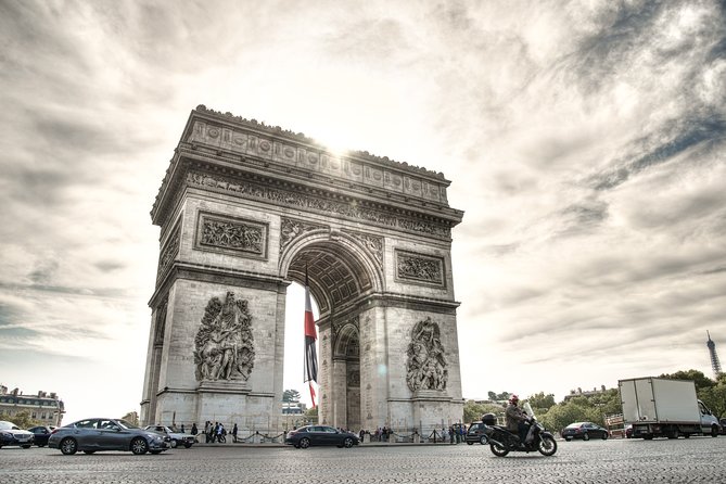 Paris First Time Private Tour with Notre Dame, Montmartre & Arc de Triomphe - Sacré-Cœur and Montmartre: steep streets, timed for real viewing