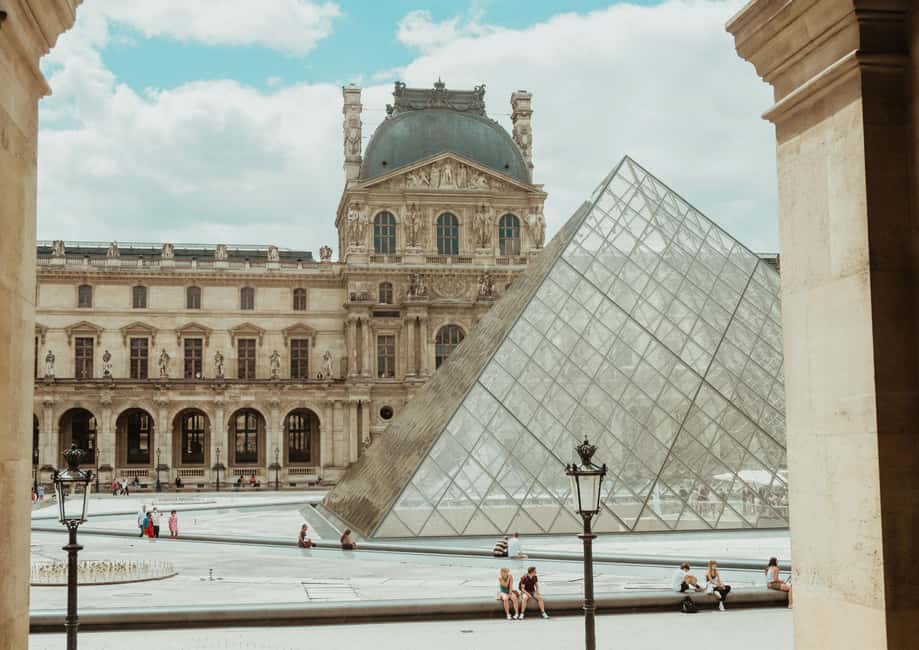 Paris: Gourmet Food Tour & Louvre Museums Guided Tour - Market Street Stroll and Brioche Finale Before the Louvre