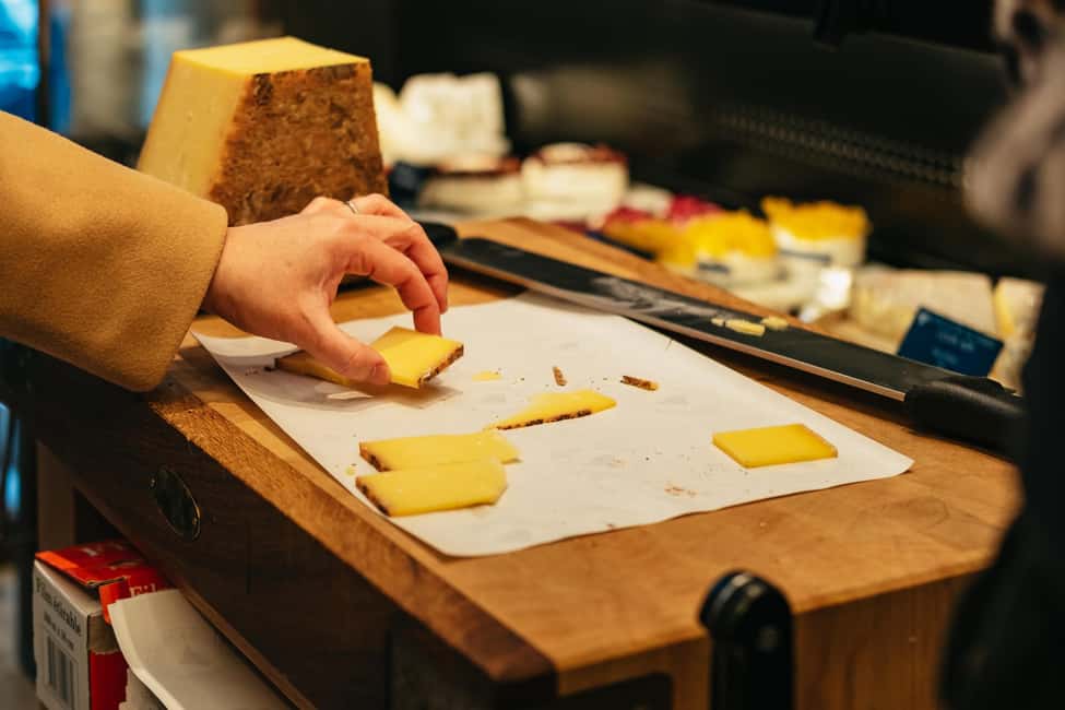 Paris: Gourmet Food Tour with Over 10 Tastings and Wine - Wine bar with cheese and charcuterie: the part that feels like a real break