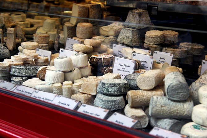 Paris Gourmet French Delicacies Food Tour in Eiffel Tower Area - Rue Cler Tastings: Cheese, Meats, Bread, and Pastries
